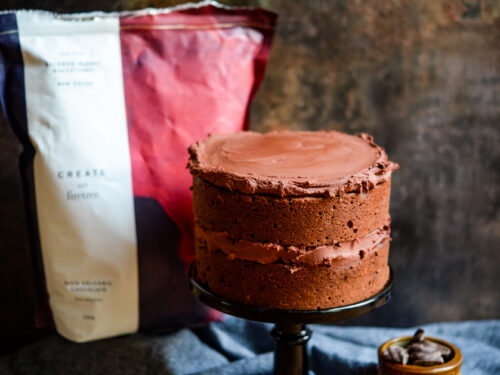 Chocolate & raspberry birthday layer cake recipe | BBC Good Food